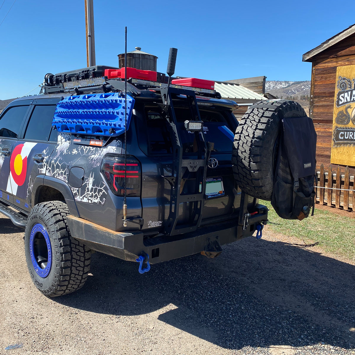 Blue shackles on a Toyota 4runner overlanding 4x4 custom rear bumper shackle mounts